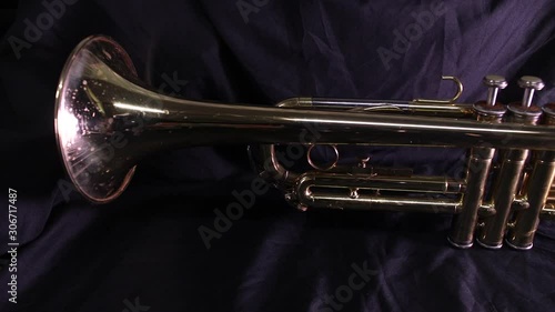 Brass trumpet only on a black background photo