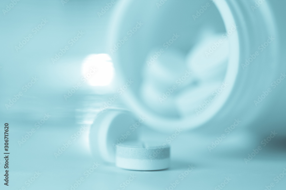 Close up of pills in a bottle. Close up of pills in a bottle.