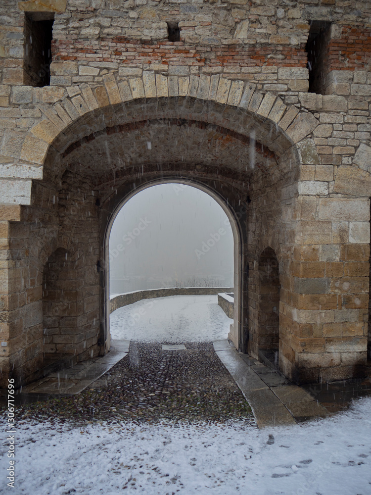 Bergamo, the old town. One of the beautiful city in Italy. Lombardia. Landscape at the old gate Porta San Giacomo during a snowfall