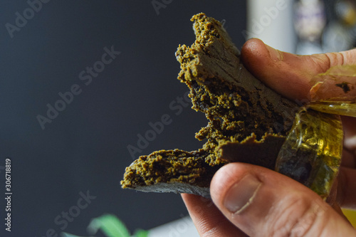 A medical marijuana plant extract. Cannabis flower extract. Weed concentrate. THC concentrate. Cannabis wax. Bubble hash