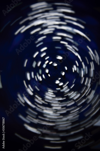 Abstract background dynamic pattern of white stripes in space