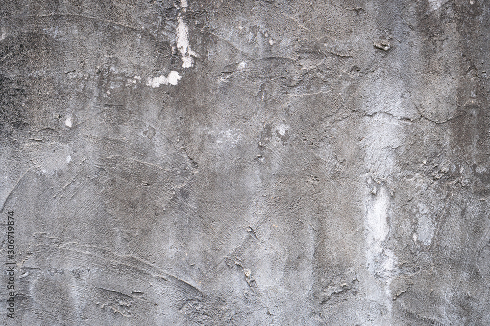 Obraz premium Gray concrete wall texture painted with white. The old white color that has been fading and peeling off. Texture of old dirty concrete wall for background.