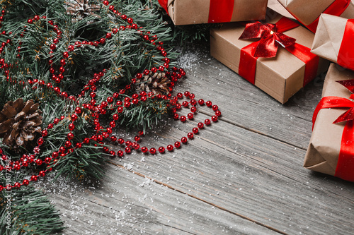 Christmas Gift Boxes On Wooden Table Copy Space photo