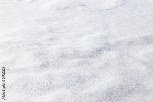 Background of freshly fallen fresh snow, candid winter image. Ideal for Christmas jobs, nativity scenes, gift cards, illustrations, children's drawings. © Enrico Tricoli