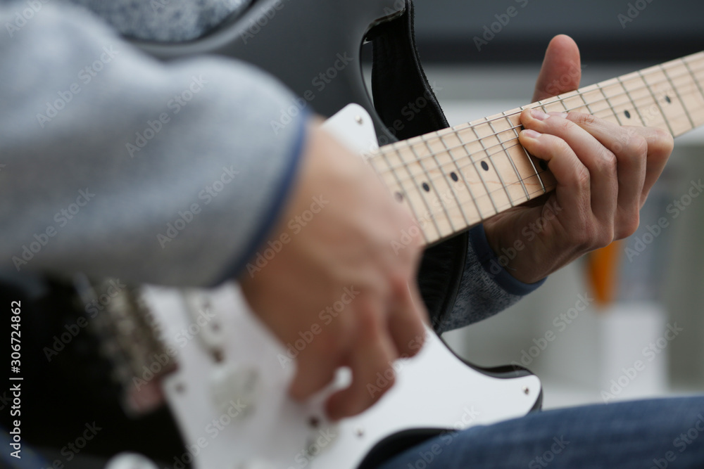 Male hands at home play and tun Male hands at home play and tun