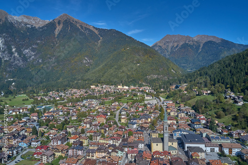 Aerial view of the ski resort Pinzolo, italy. Morning is the autumn season. In the background a clear blue sky