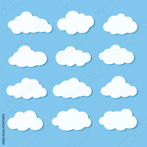 Set of different white cloud icons on blue sky for design elements, stock vector illustration