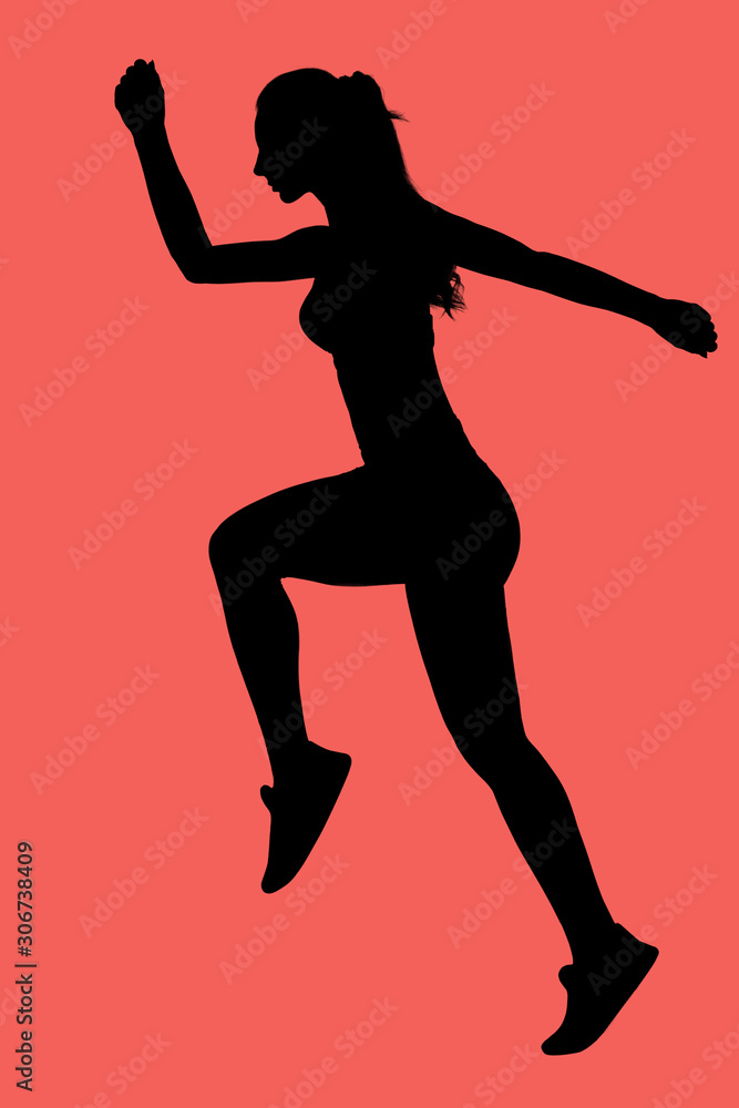 Black silhouette of slender female athlete running on red background