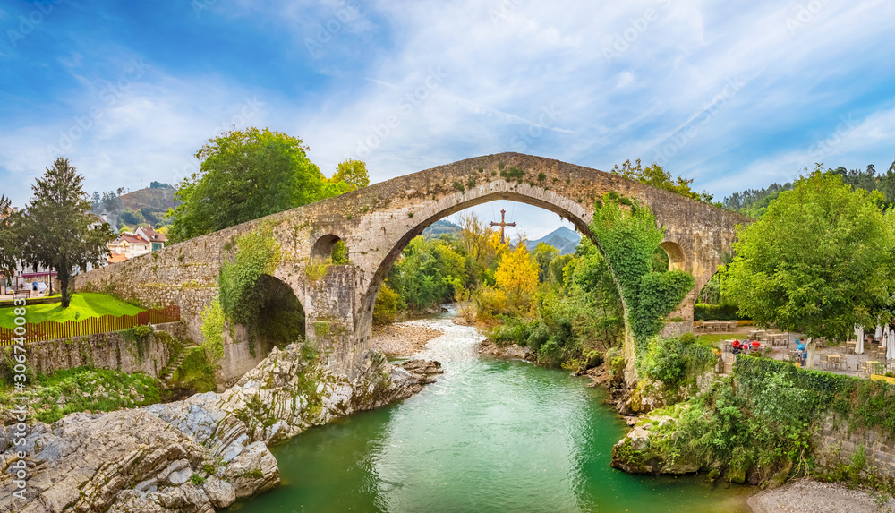 Roman hump-backed bridge on the Sella River in Cangas de Onis, Asturias, Spain