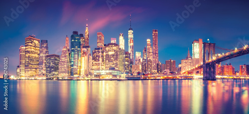Panorama of Manhattan midtown at dusk with skyscrapers, New York City