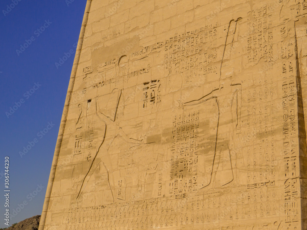 Hieroglyphics in the Medinet Habu Temple in Luxor, Egypt