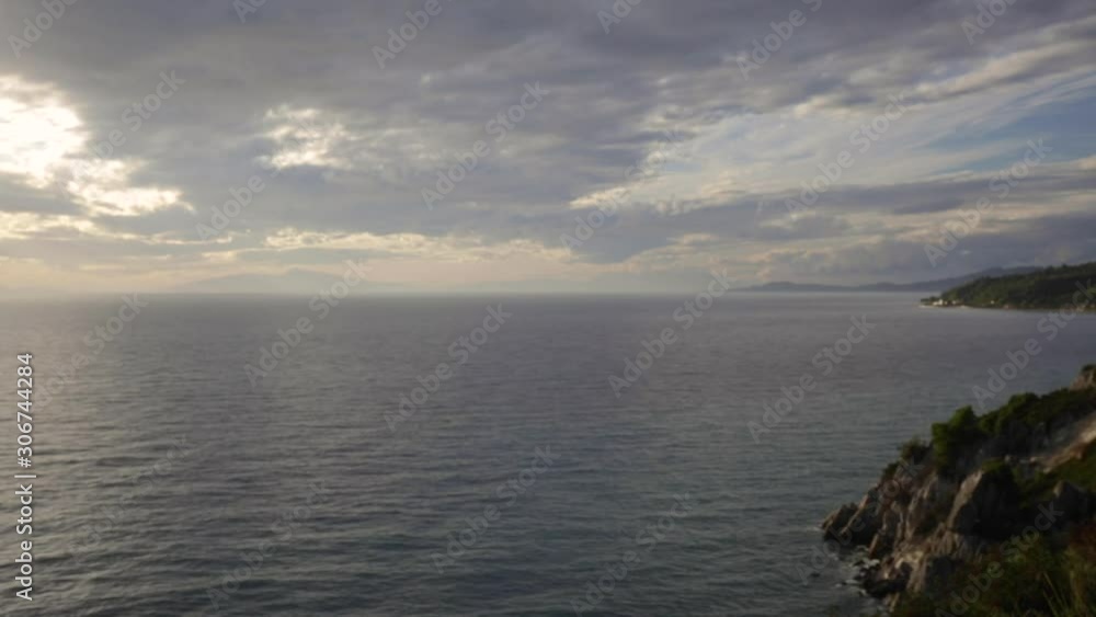 the eternal surf of the sea waves on the sandy shore on a cloudy autumn day after a storm against a cloudy sky without the sun the eternal surf of the sea waves on the sandy shore on a cloudy autumn day after a storm against a cloudy sky without the sun