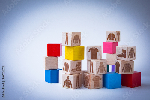 children's toy wooden colored cubes with a pattern of clothes for work