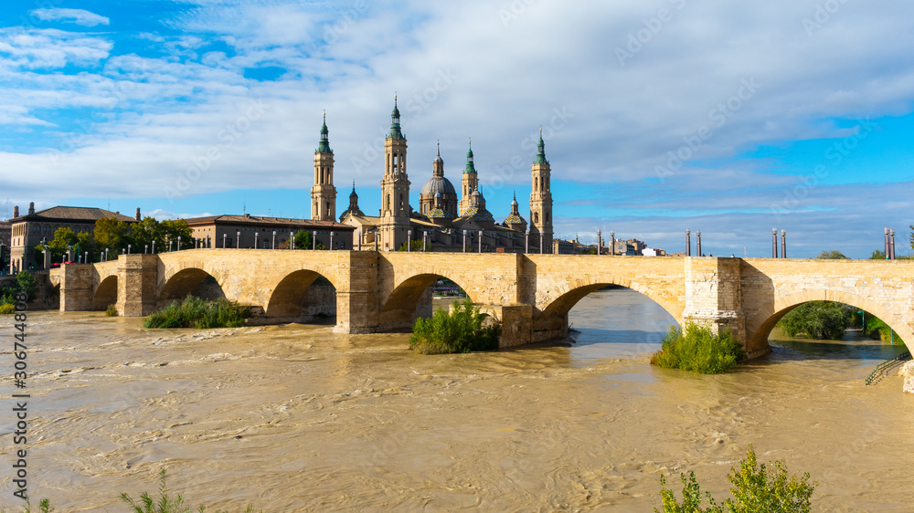 Puente de Piedra (Stone Bridge) and the Basilica of Our Lady of the Pillar in the downtown of Zaragoza, Spain