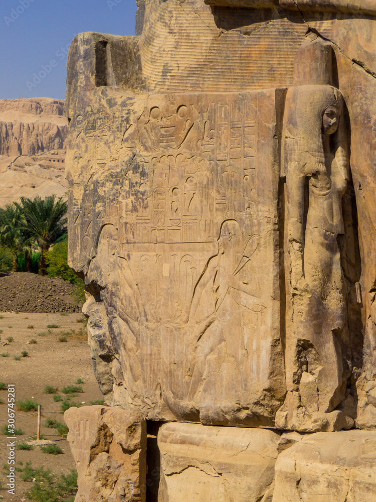 Close up of one of the Colossi of Memnon, Mortuary Temple of Amenhotep III, Luxor, Egypt
