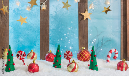 Fotografi christmas background with window sill illuminated with lights and ornaments