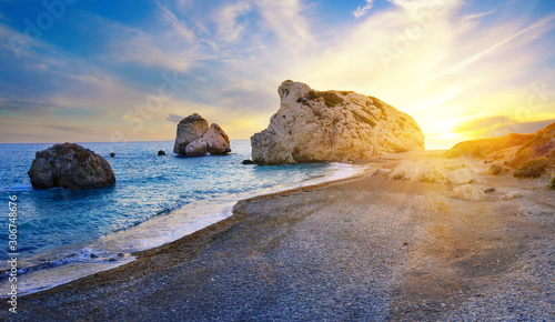 Aphrodite's beach and stone at sunset in bright sunshine photo