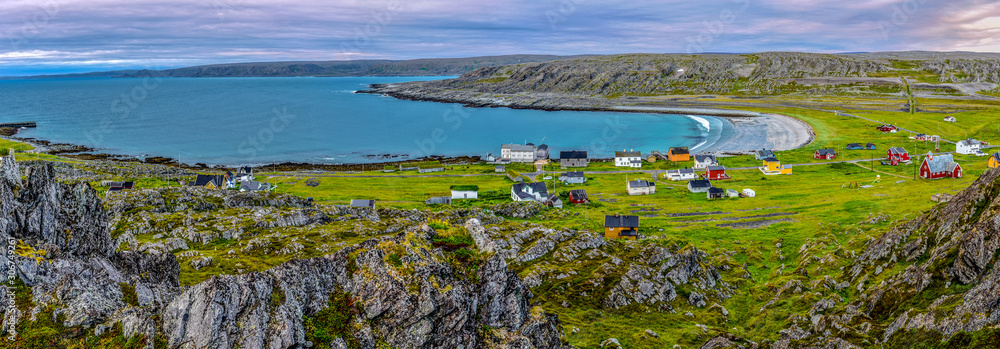 Panoramic view at abandoned fishers’ village Hamningberg and the shore of the Barents Sea as viewed from the fort. Finnmark, Norway.