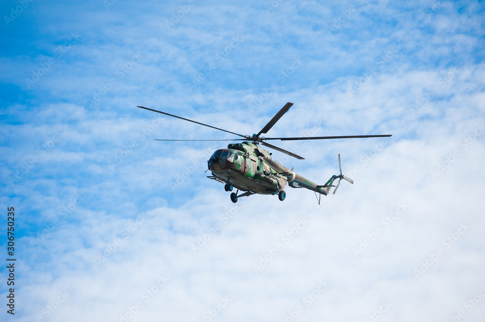 Fototapeta premium Military helicopter flying during exercise