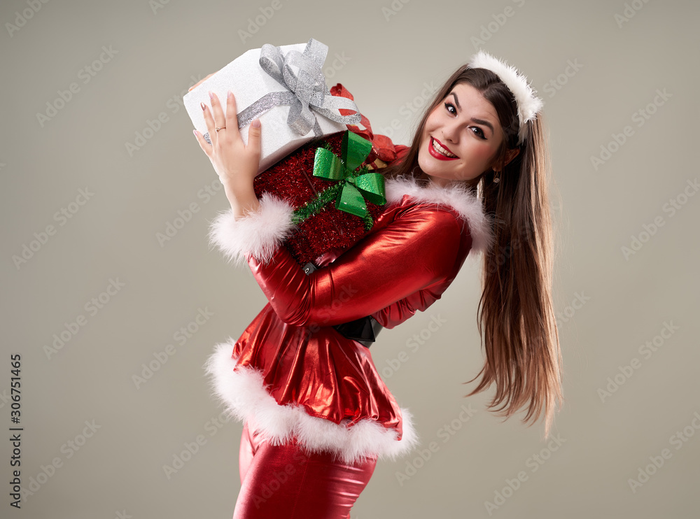 Santa girl with presents to give Santa girl with presents to give