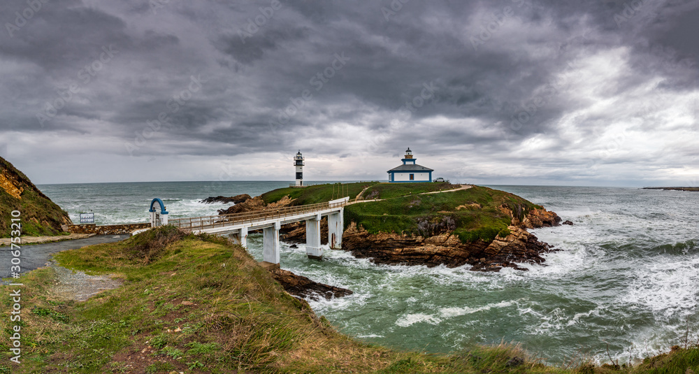 Panoramic view of island with lighthouse and bridge