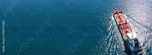 Photos Aerial drone panoramic photo of industrial oil and fuel tanker cruising deep blu