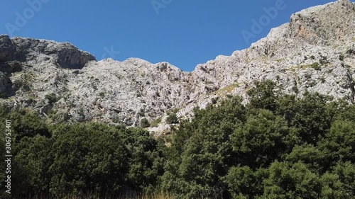 Mountains in Mallorca in good weather, camera pans from right to left