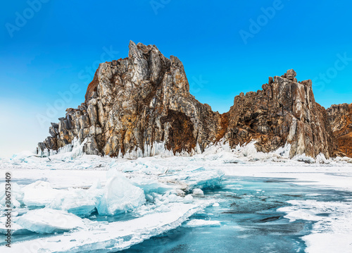 View of Shamanka rock on a sunny winter day. Lake Baikal, Olkhon island. Eastern Siberia, Russia