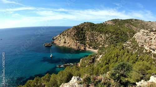 View of a paradise bay in good weather, static camera with authentic shaking photo