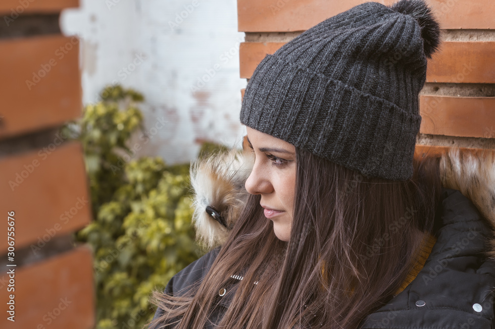 Fototapeta premium Young woman traveling alone in winter