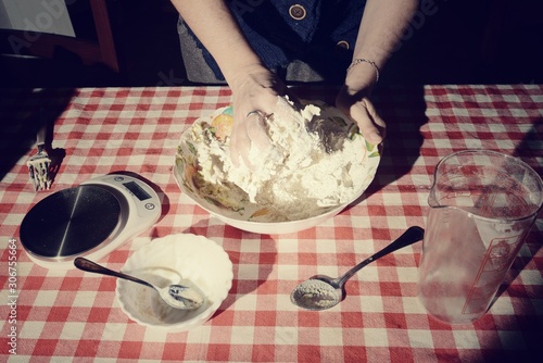 homemade preparation of italian pizza food - knead and mix