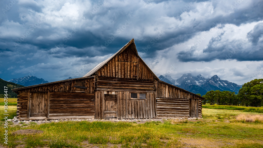 Storm clouds over Mormon barn, Grand Teton National Park Storm clouds over Mormon barn, Grand Teton National Park