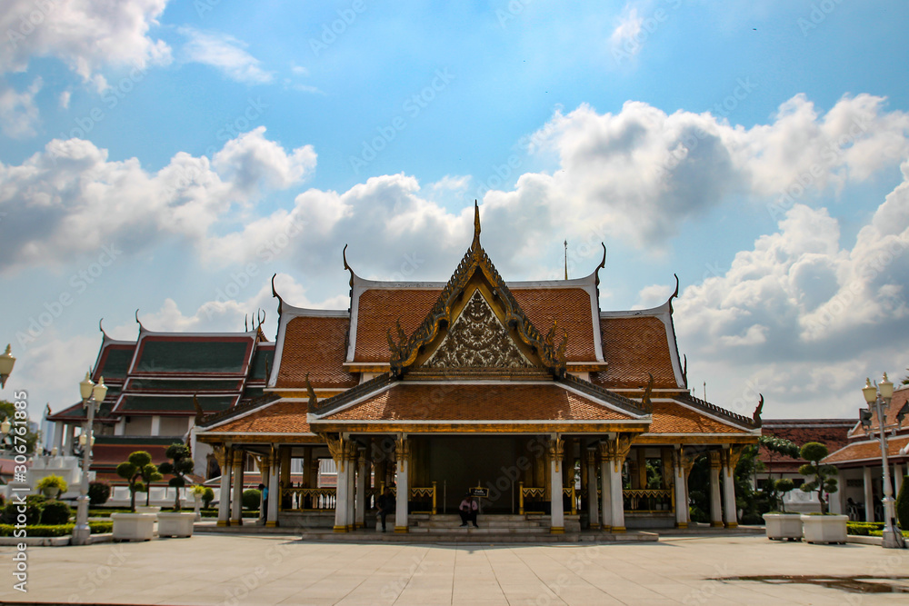 Asia building roof by side view. Roof of a Buddhist temple. The roof architecture of Thai buildings such as Buddha temples and traditional noble houses.