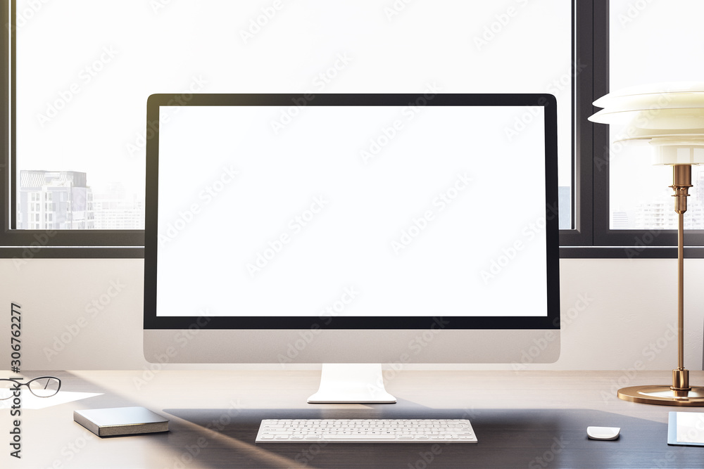 Desktop with empty white computer screen Desktop with empty white computer screen