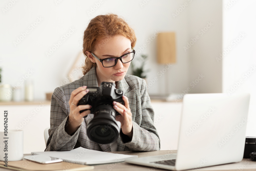 Reporter off loading files from camera to laptop Reporter off loading files from camera to laptop