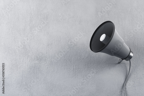 Fotografia Old loud speaker on concrete wall