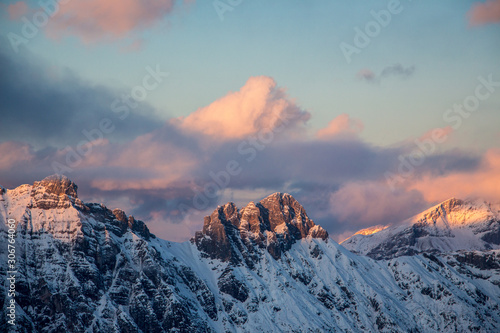 Mountain portrait Birnhorn Saalbach sunset purple light clouds reflecting the mountainscape © Andreas