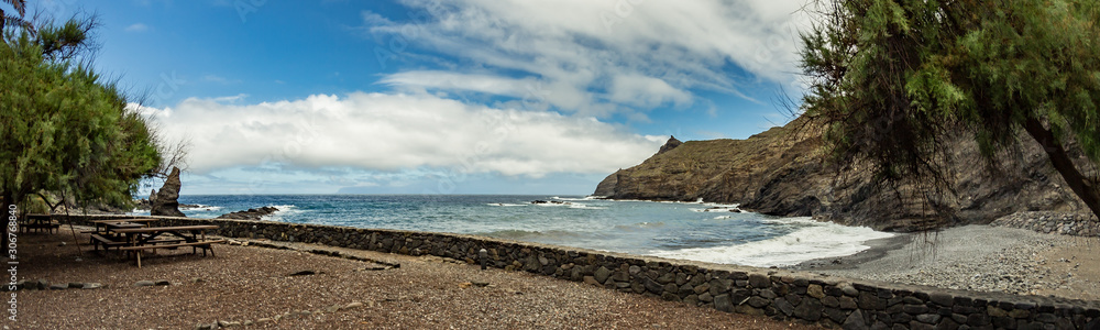 Playa De Caleta the north-eastern part of La Gomera island. Favorite vacation spot of local residents of Hermigua and Santa Catalina as well as tourists. Canary Islands, Spain Playa De Caleta the north-eastern part of La Gomera island. Favorite vacation spot of local residents of Hermigua and Santa Catalina as well as tourists. Canary Islands, Spain