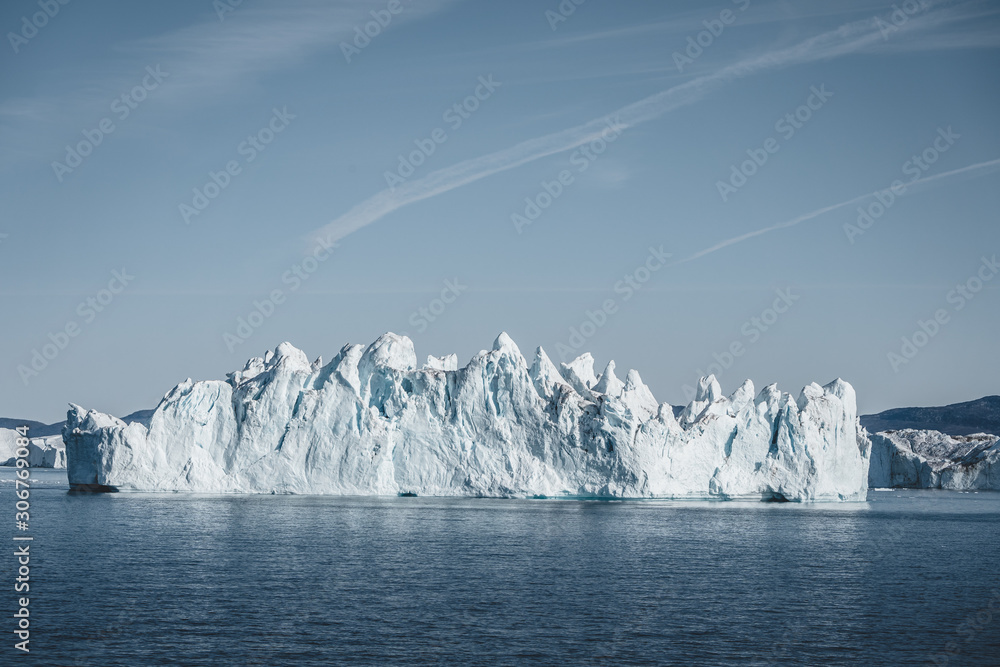 Greenland. The biggest glacier on a Jakobshavn. Huge icebergs of