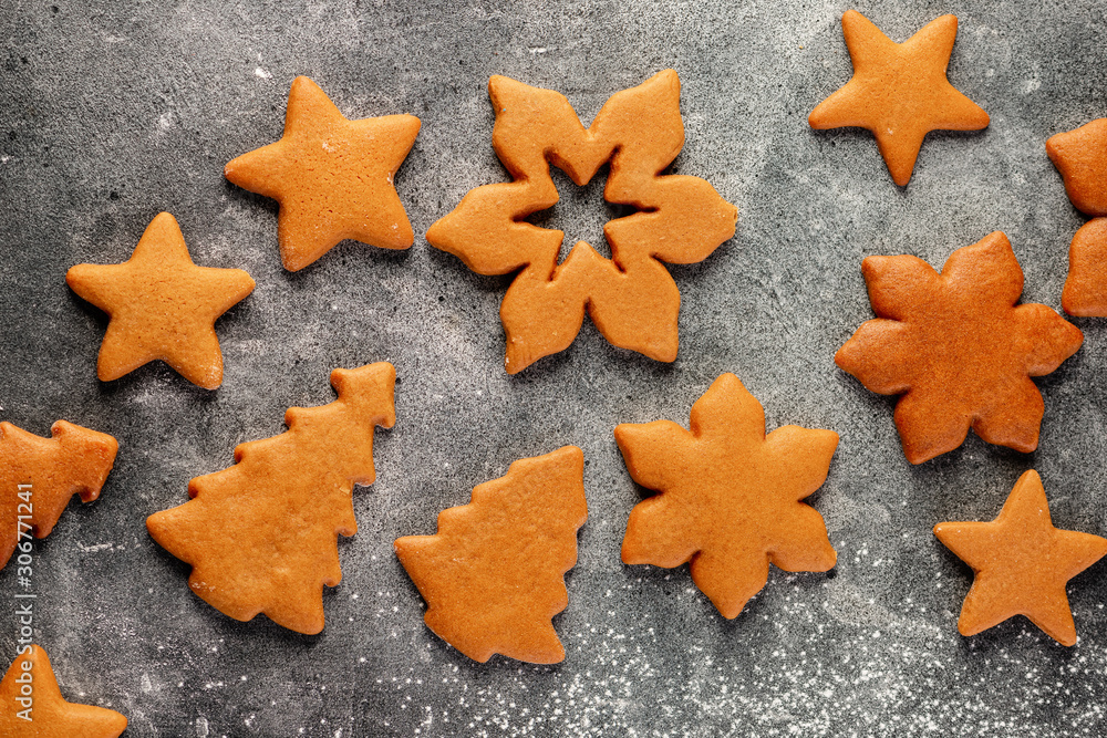 Collection of various gingerbread cookies with flour Collection of various gingerbread cookies with flour