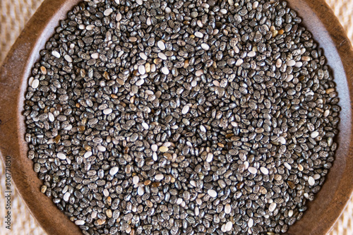 Edible seeds of chia, Salvia hispanica, a flowering plant of the mint family. A popular healthy food product.