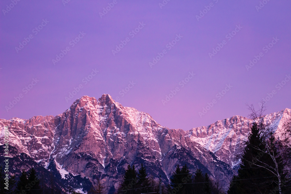 sunset in mountains over seeded Austria 