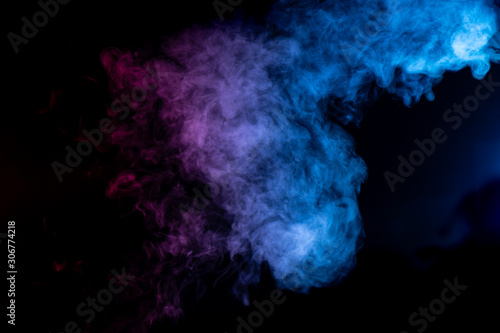 abstract purple and blue smoke cloud on black background