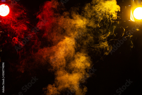 abstract red and yellow smoke overlay on black background
