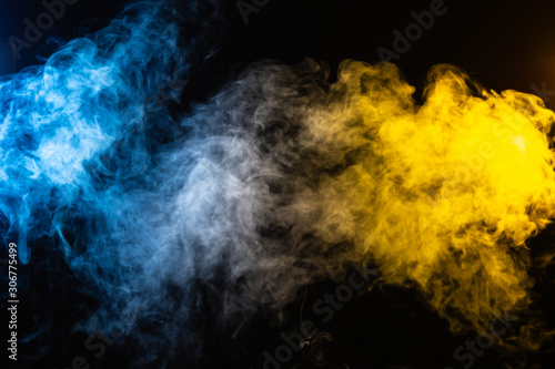 abstract blue and yellow smoke background with space for text