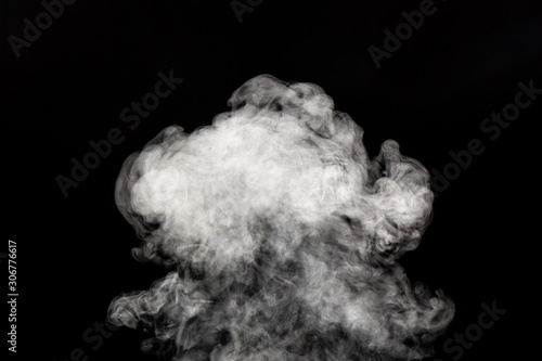 white poofy smoke on black background