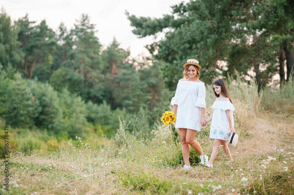 Young mother and her daughter have fun, mother's Day. Young mother and her daughter have fun, mother's Day.