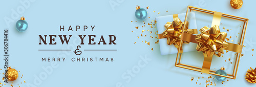 Happy New Year. Holiday banner Merry Christmas. Xmas design realistic gift boxes, 3d hollow gift-shaped cube, gold balls, glitter gold confetti. Festive Horizontal poster, header for website