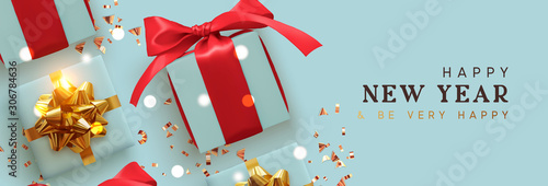Happy New Year. Holiday Background with realistic gift boxes, golden glitter confetti, bokeh lights. Happy New Year and Be Very Happy. Horizontal Christmas poster, greeting card, headers for website