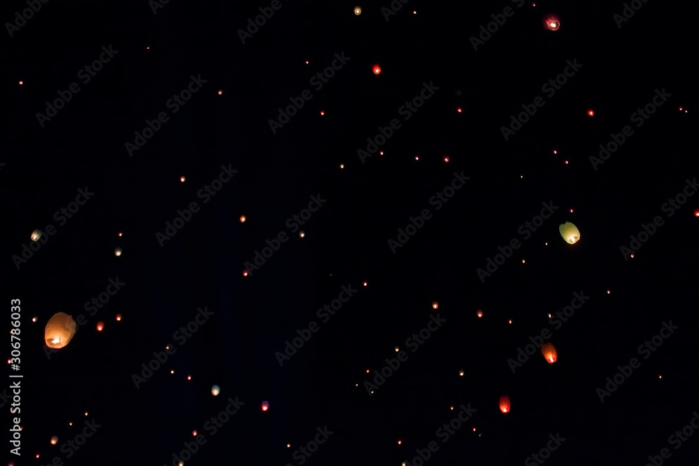 A thousand lanterns fly in the beautiful sky at night A thousand lanterns fly in the beautiful sky at night